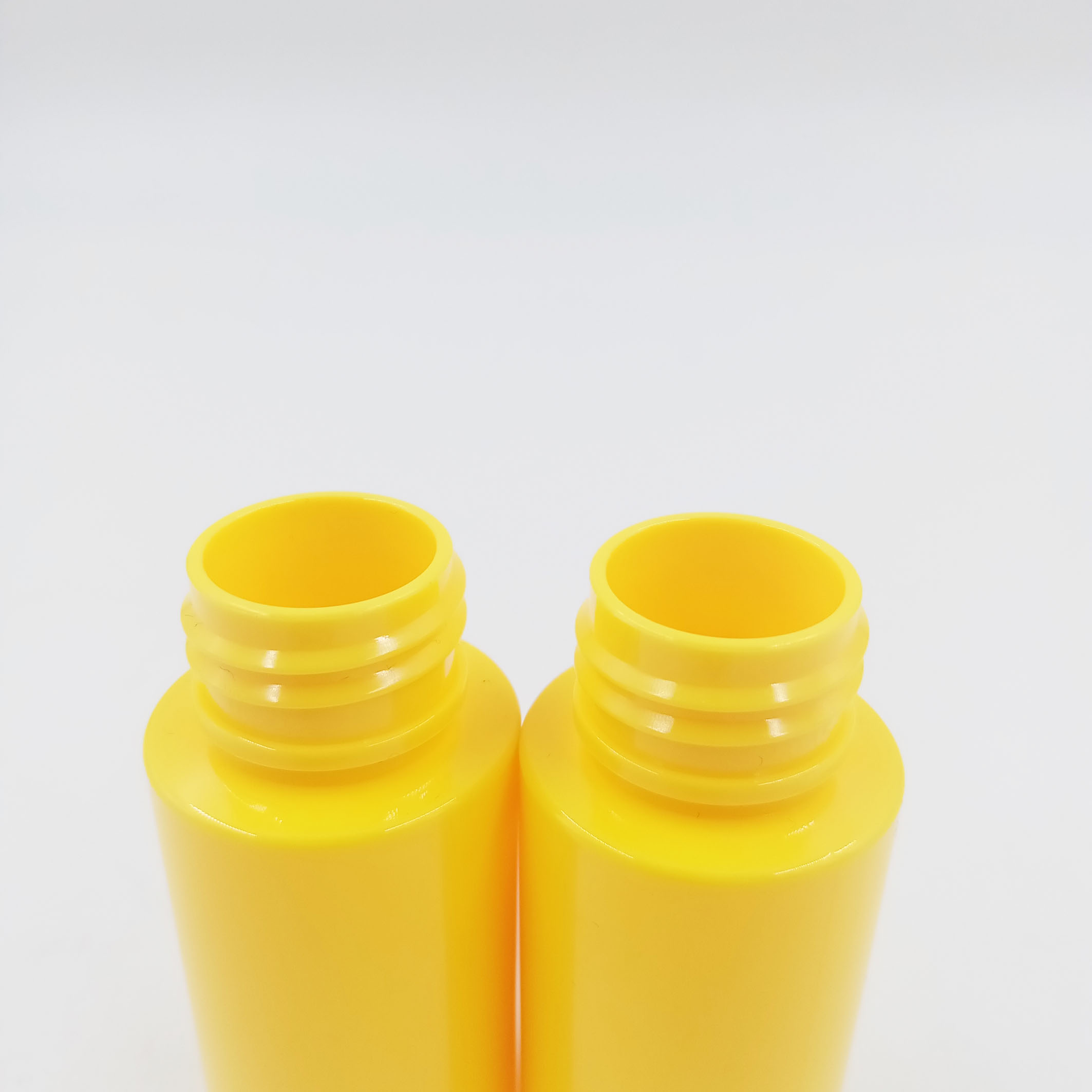 Yellow Plastic Lotion Bottles