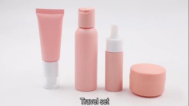 Orange plastic bottle sets for plastic cosmetic packaging.